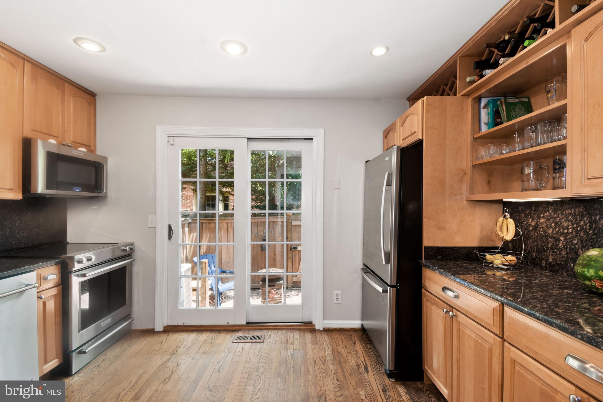 1203 Portner Road Alexandria, VA 22314 - Photo 10 of 40 Ample Kitchen with French Style Doors to teh Patio