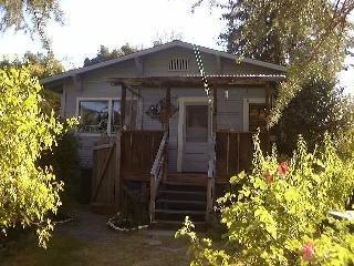 225 Dutton Avenue Sebastopol, CA 95472 - Photo 3 of 10 a front view of a house with garden