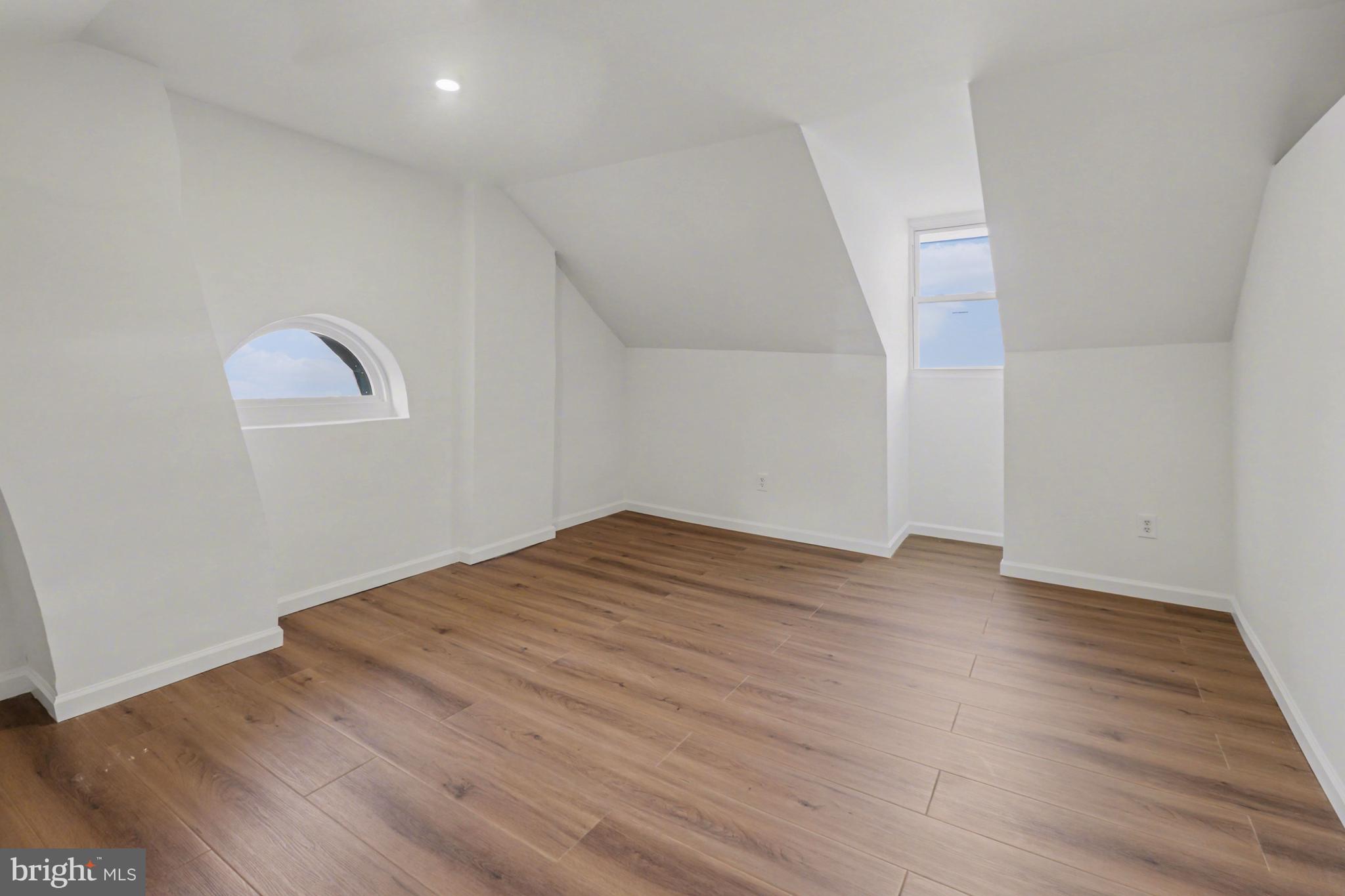 1006 Colebrook Road Lebanon, PA 17042 - Photo 31 of 41 an empty room with wooden floor and windows