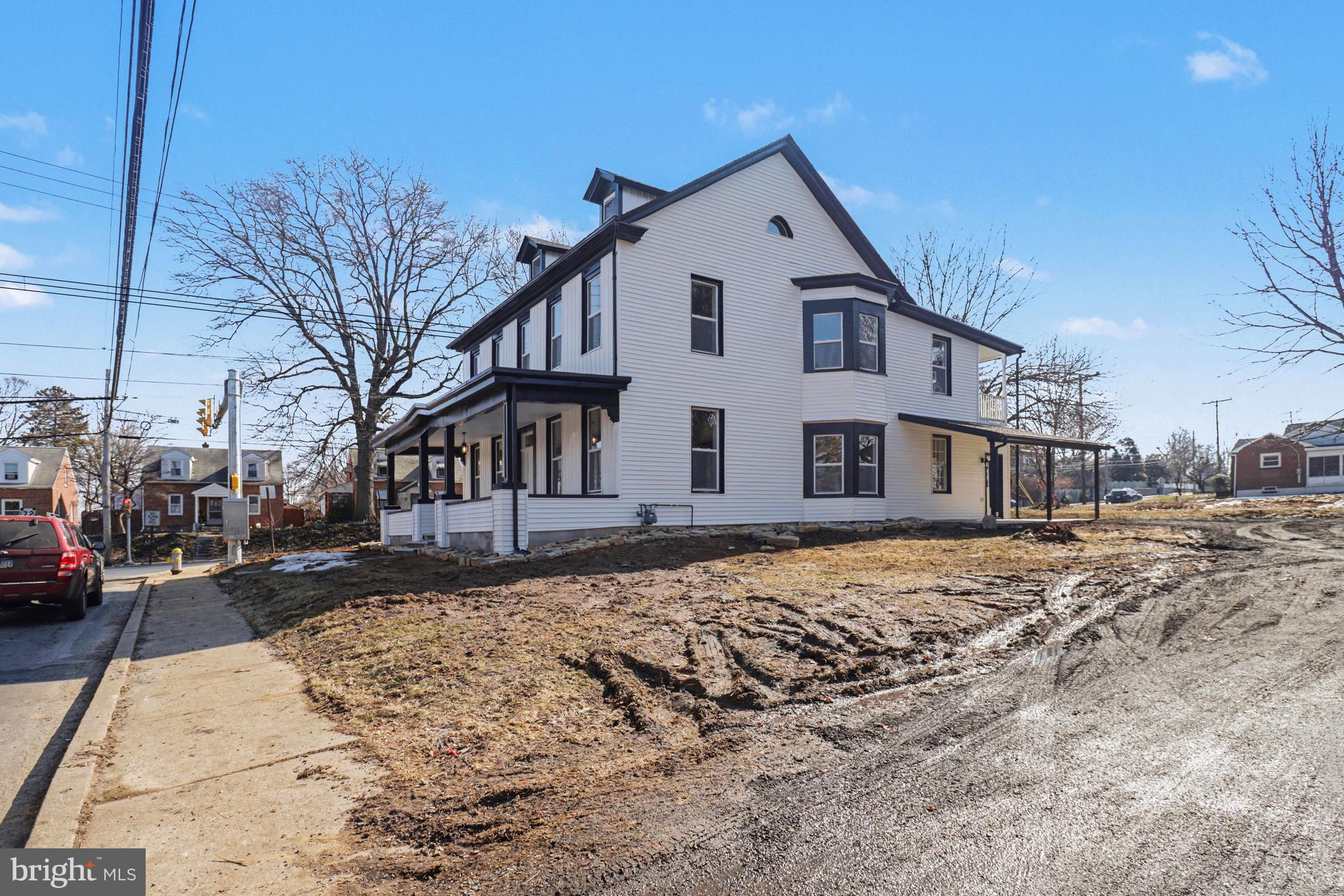 1006 Colebrook Road Lebanon, PA 17042 - Photo 36 of 41 a view of a white house with a yard covered in snow