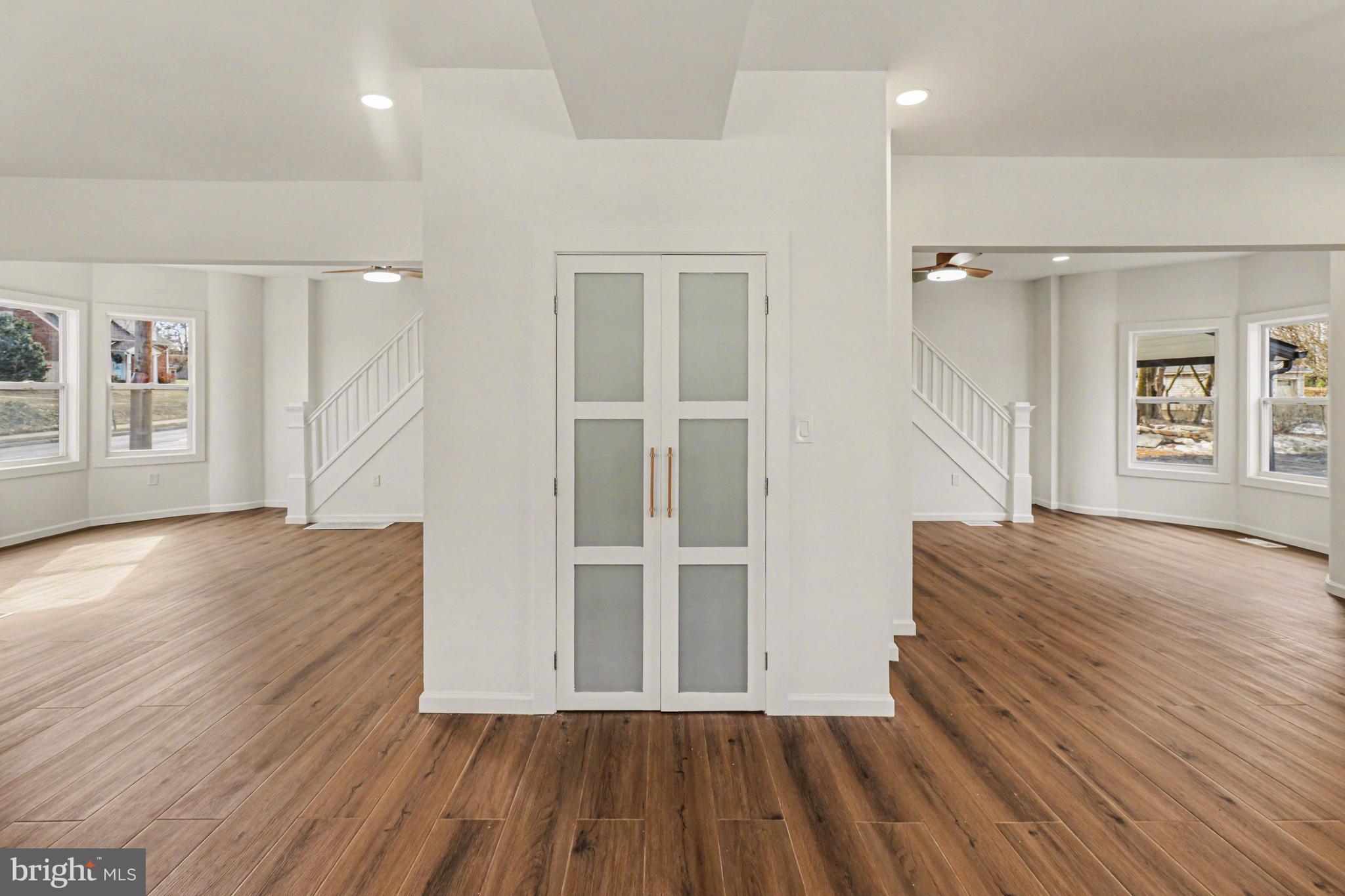 1006 Colebrook Road Lebanon, PA 17042 - Photo 4 of 41 an empty room with wooden floor and windows