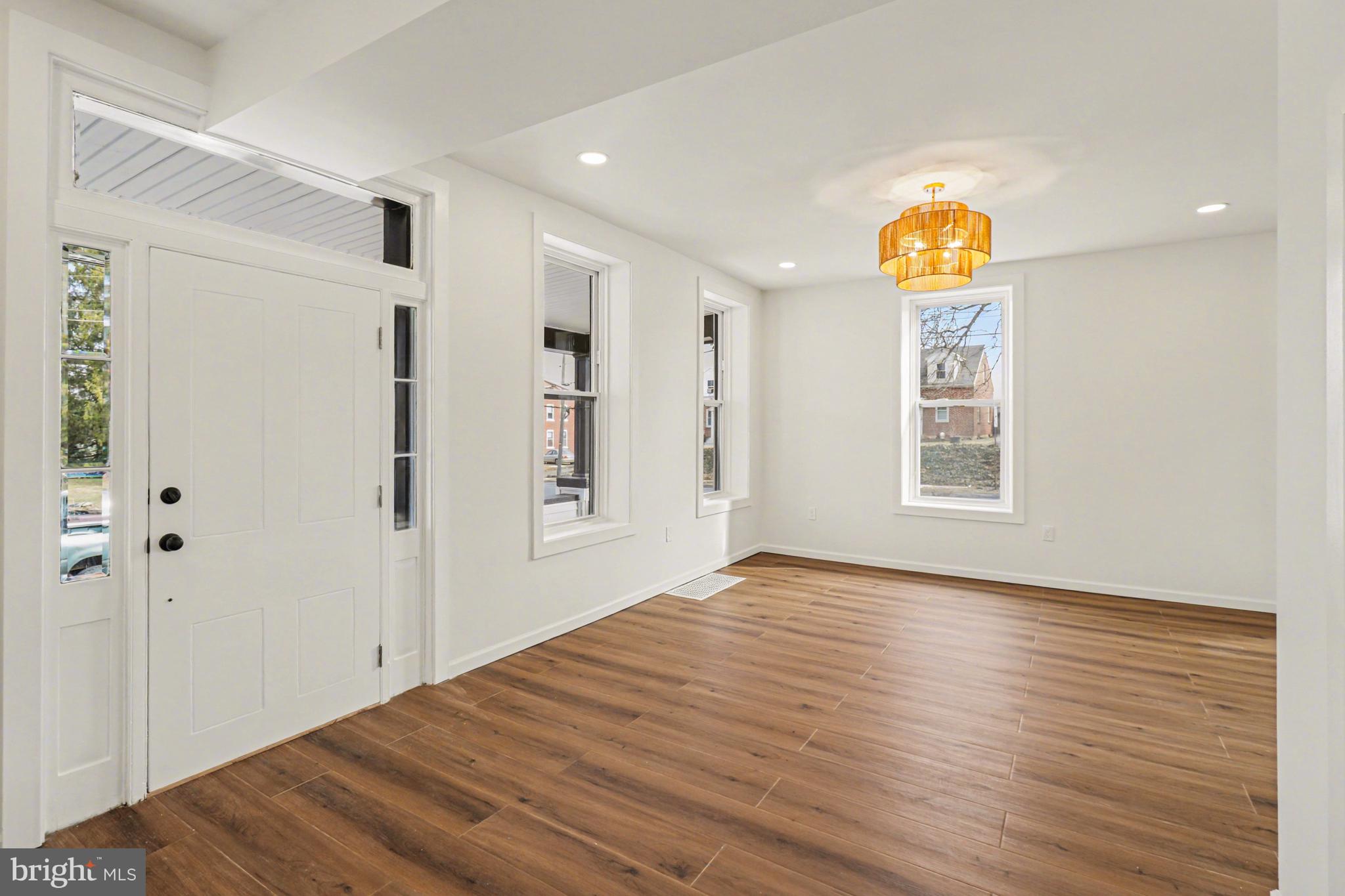 1006 Colebrook Road Lebanon, PA 17042 - Photo 5 of 41 a view of empty room with wooden floor and fan