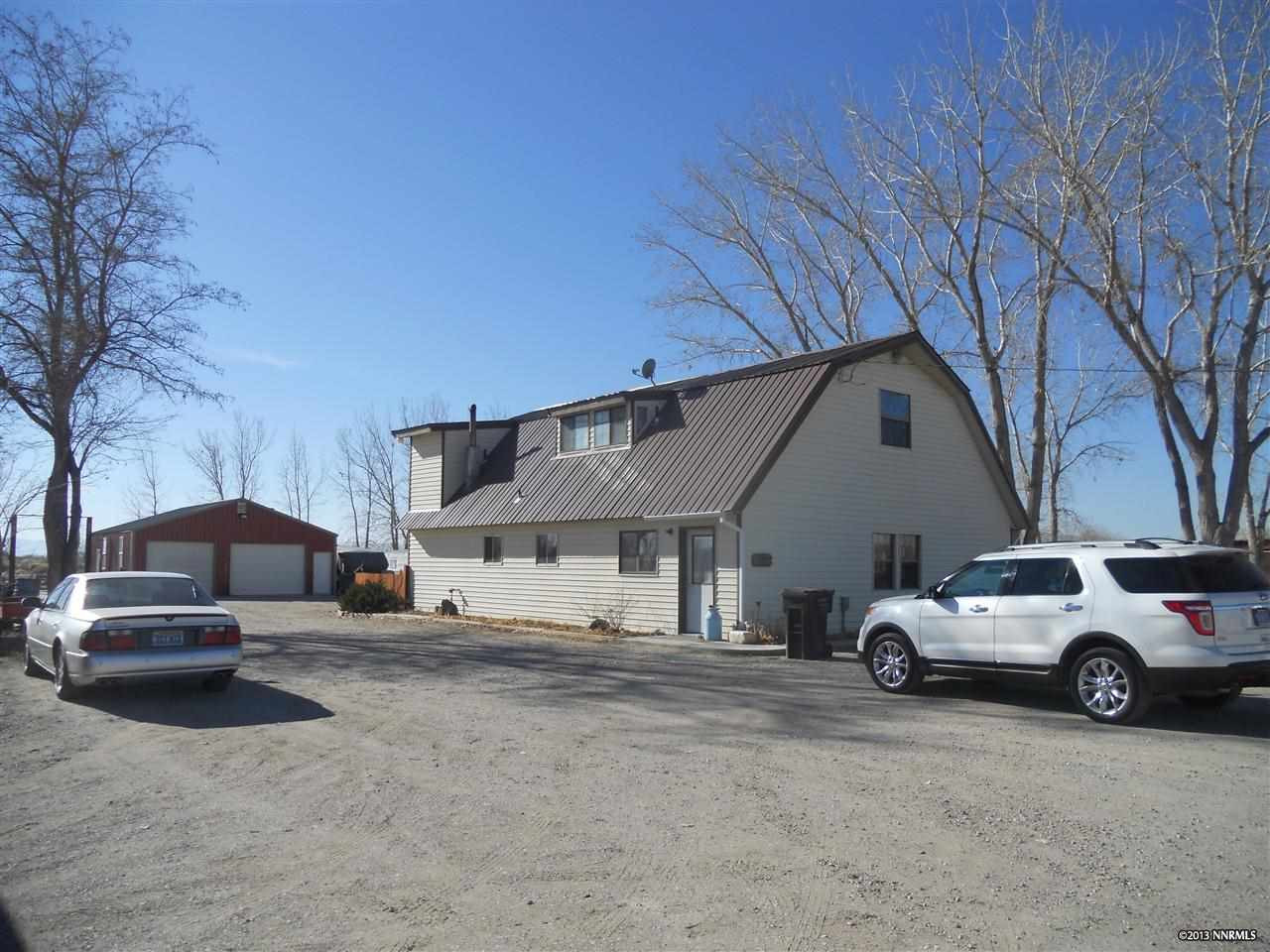 4155 Schindler Road Fallon, NV 89406 - Photo 1 of 1 a view of a car parked in front of a house