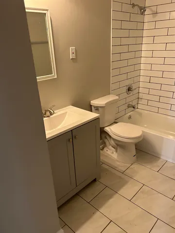 a view of a livingroom with wooden floor