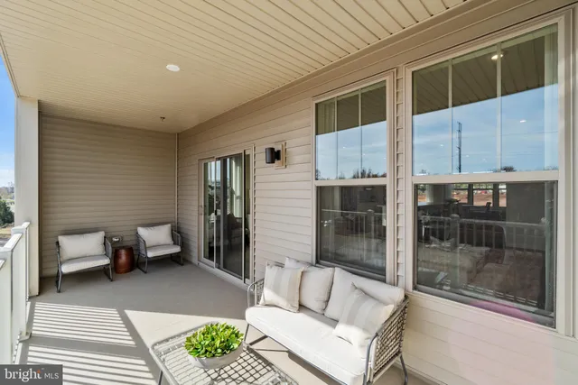 a balcony with furniture