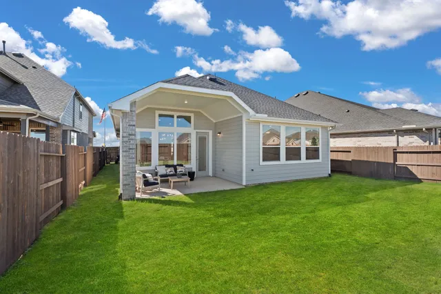 a view of a house with a garden