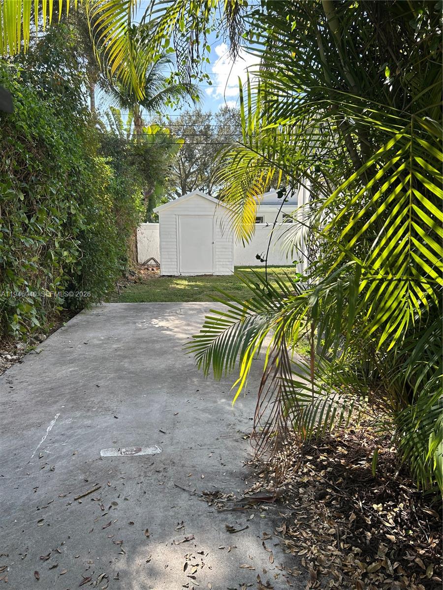 5840 Southwest 51st Street Miami, FL 33155 - Photo 14 of 15 a view of a yard with a tree