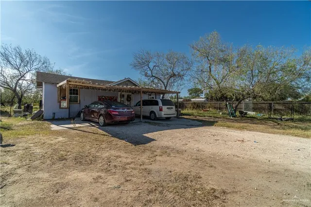 a car parked in front of a house