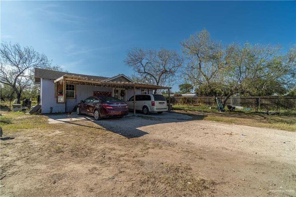 a car parked in front of a house