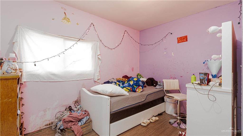 313 Eva Street Edcouch, TX 78538 - Photo 8 of 17 a room with toys and toys