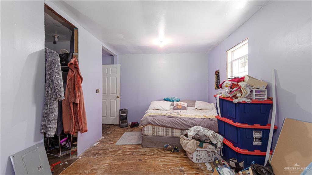 313 Eva Street Edcouch, TX 78538 - Photo 10 of 17 a bedroom with furniture and a window