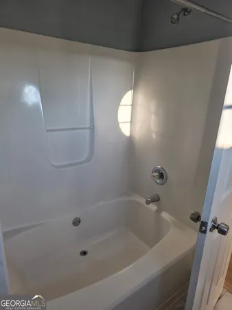 a bathroom with a bathtub