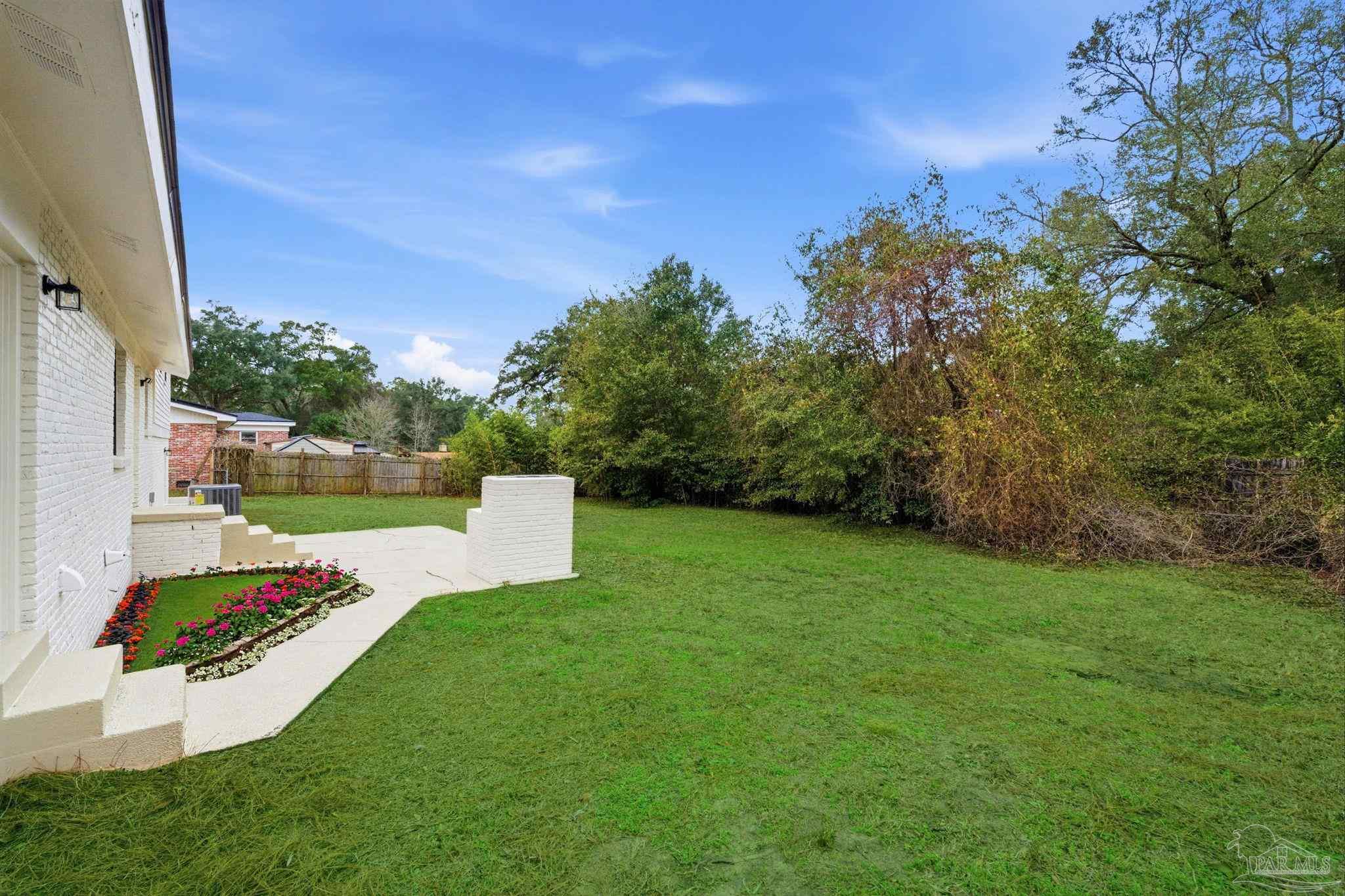 6534 Berryhill Road Milton, FL 32570 - Photo 36 of 38 a view of a park with a slide