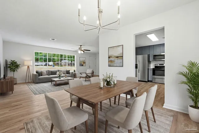 a view of cabinets and wooden floor
