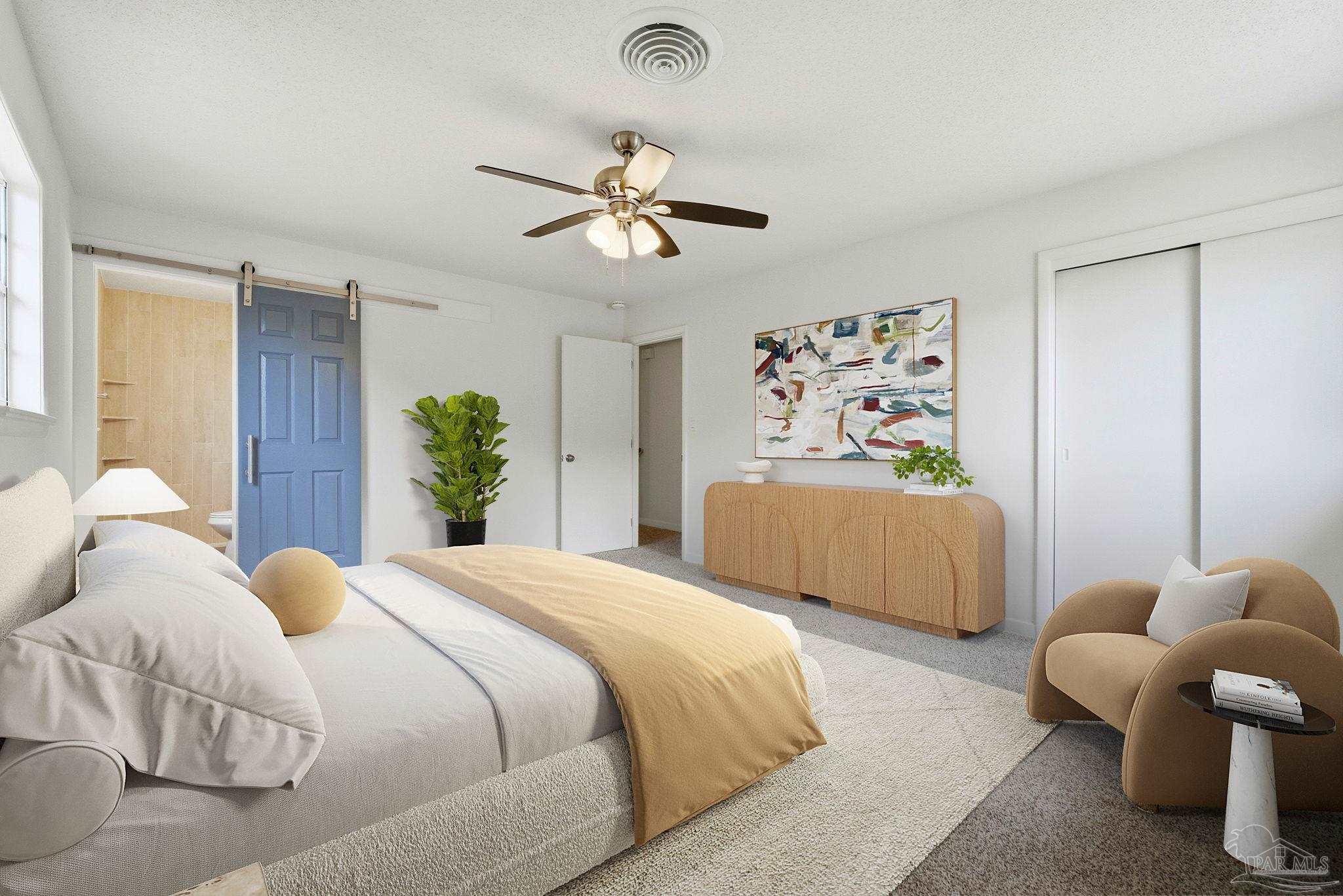 6534 Berryhill Road Milton, FL 32570 - Photo 7 of 38 a bedroom with bed and a chandelier