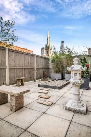 a view of a terrace with sitting area