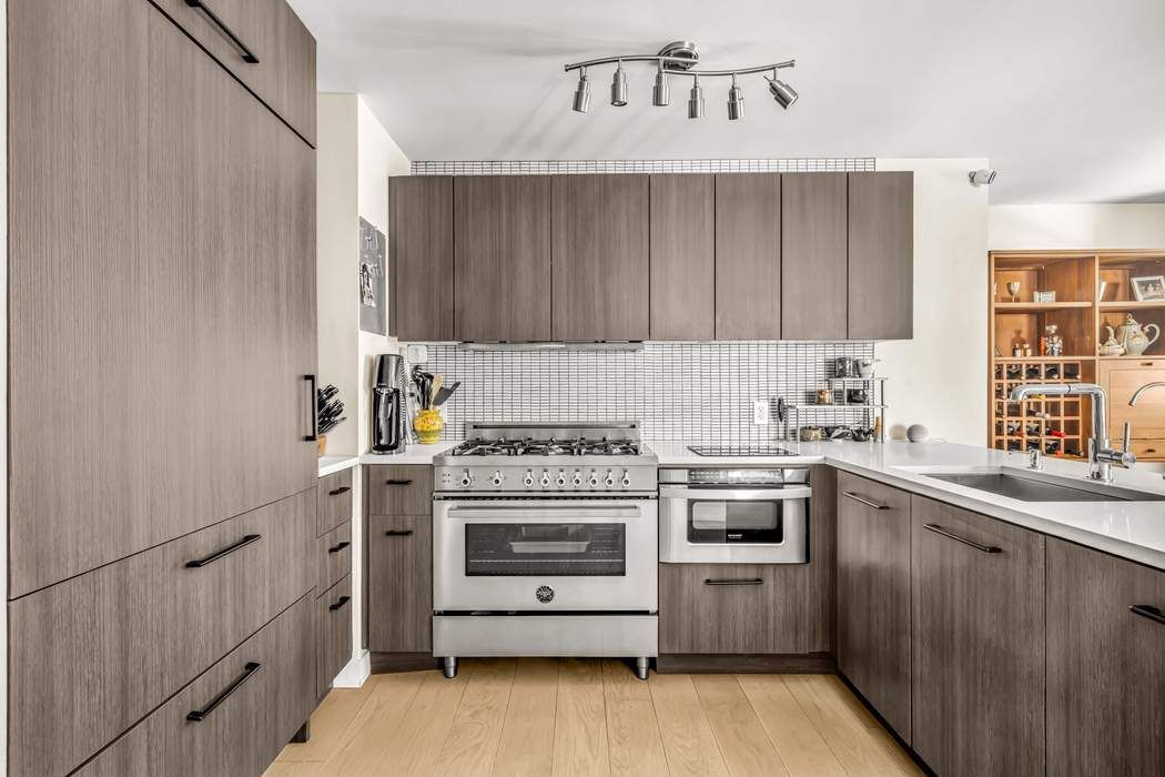 175 West 95th Street, Unit 2C Manhattan, NY 10025 - Photo 4 of 18 a kitchen with a stove oven and sink
