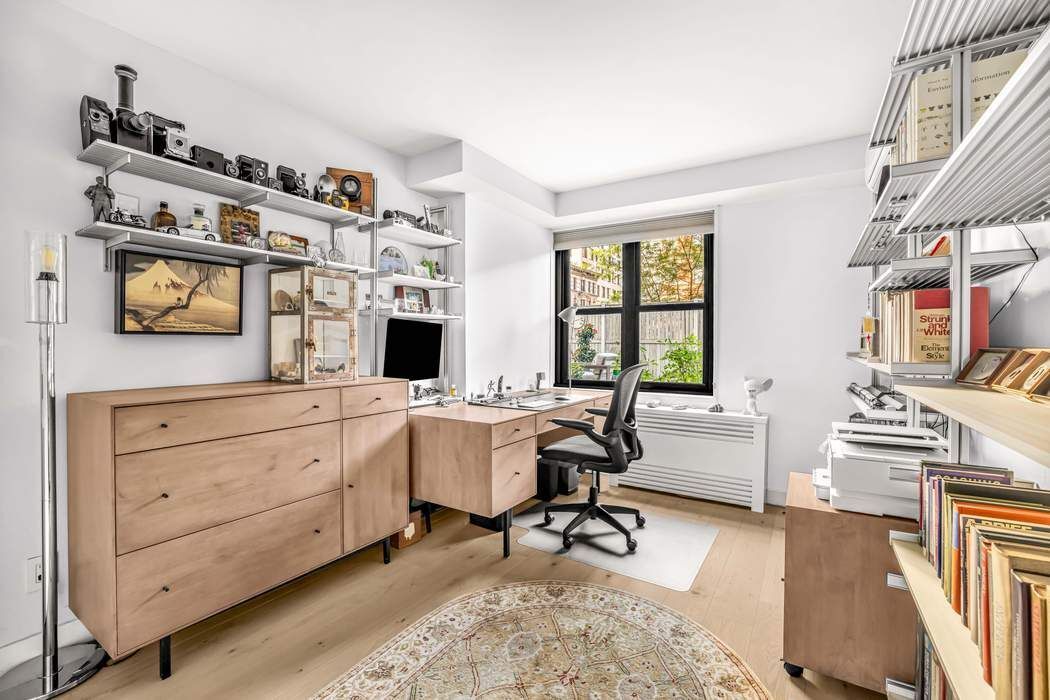 175 West 95th Street, Unit 2C Manhattan, NY 10025 - Photo 8 of 18 a view of a workspace with furniture and a window