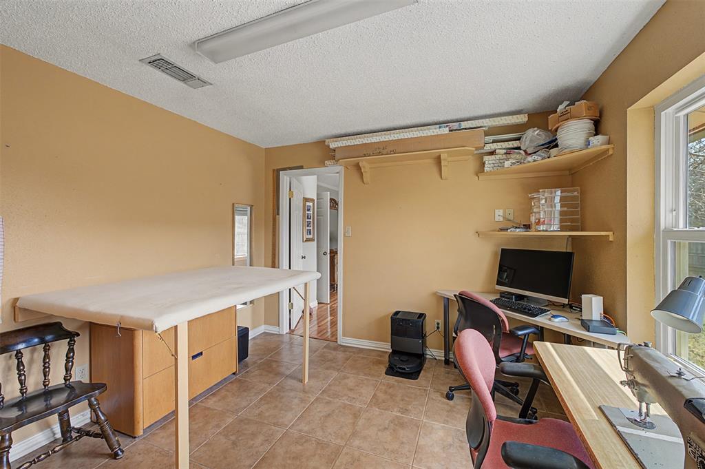 8240 Kramer Street Burleson, TX 76028 - Photo 15 of 39 a room with furniture and a desk