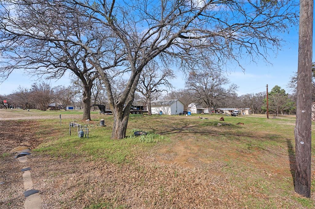 8240 Kramer Street Burleson, TX 76028 - Photo 35 of 39 a view of yard with tree