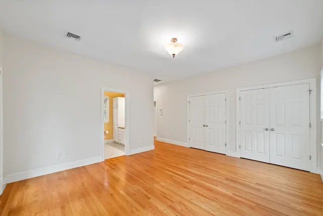 a bathroom with a tub and shower