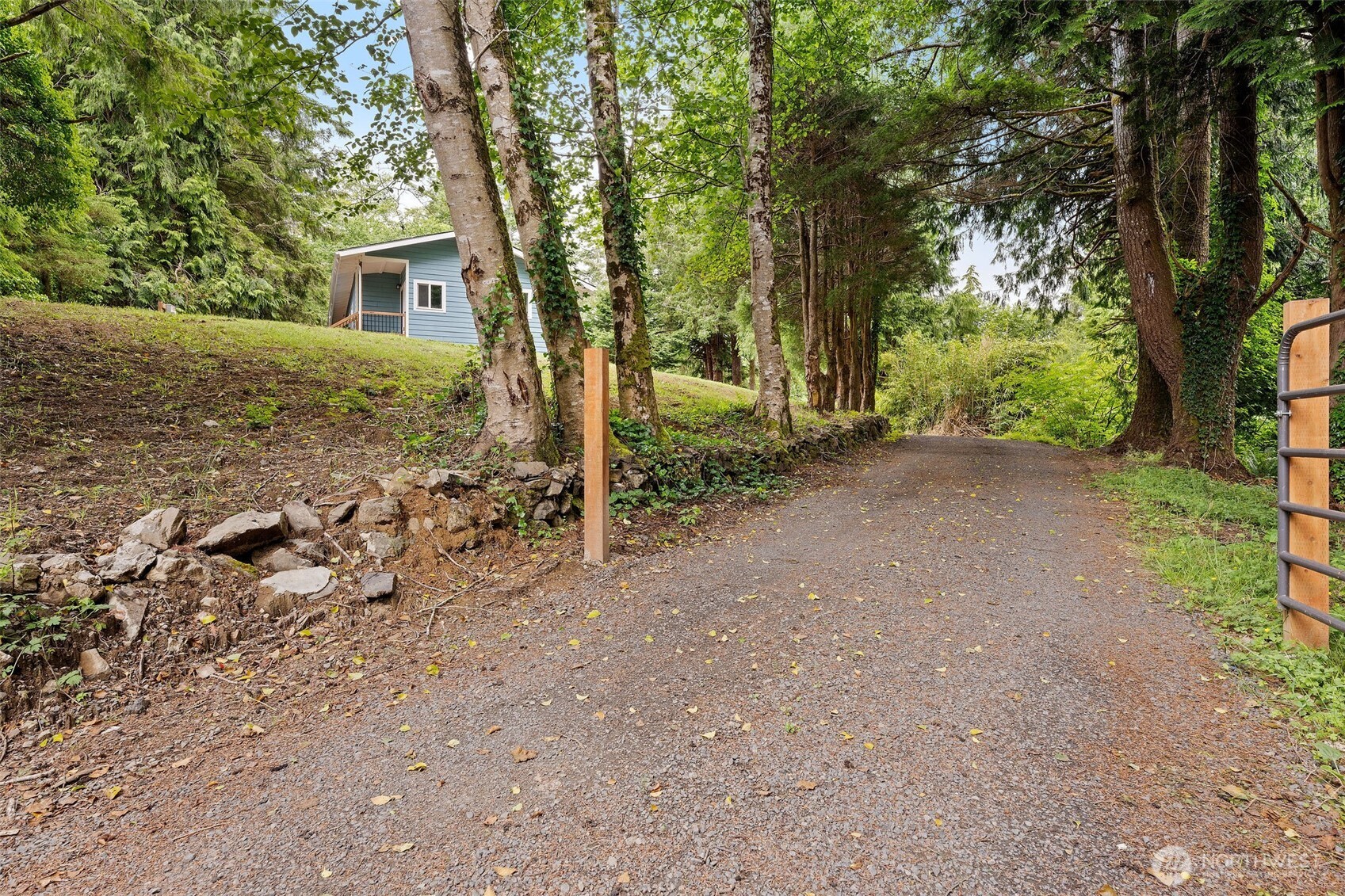 2693 Highway 101 Long Beach, WA 98631 - Photo 3 of 31 a view of a house with large trees