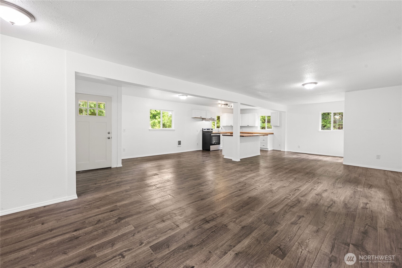 2693 Highway 101 Long Beach, WA 98631 - Photo 10 of 31 a view of empty room with wooden floor