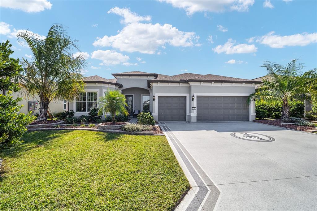 6357 Southwest 97th Terrace Road Ocala, FL 34481 - Photo 1 of 1 a view of swimming pool with outdoor seating and house in the background
