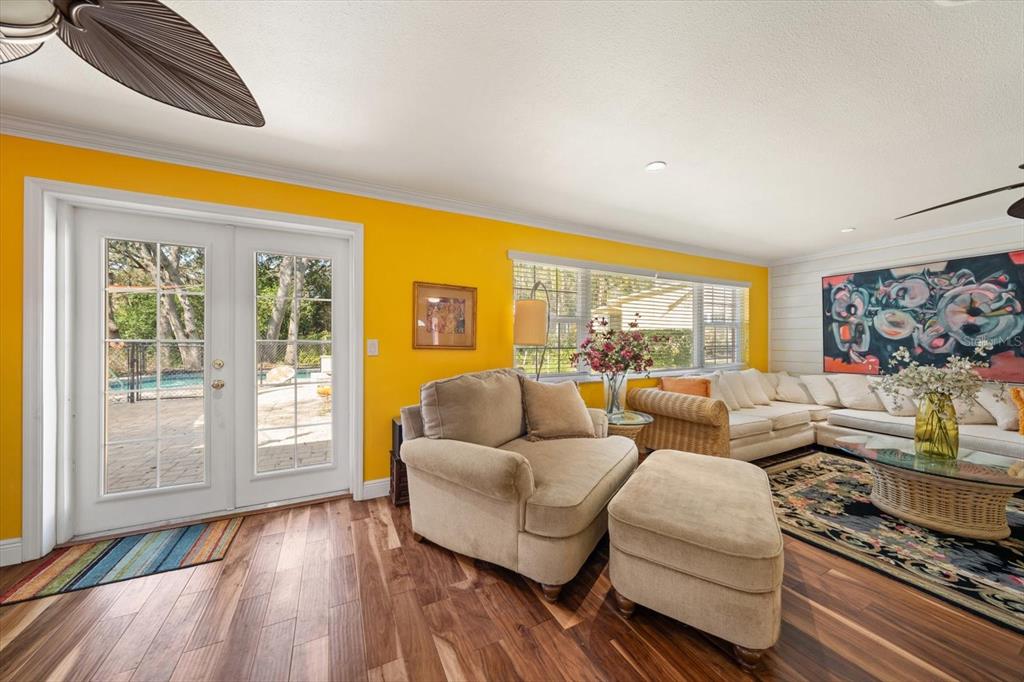 1921 Cardinal Road Dunedin, FL 34698 - Photo 11 of 52 a living room with furniture and a window