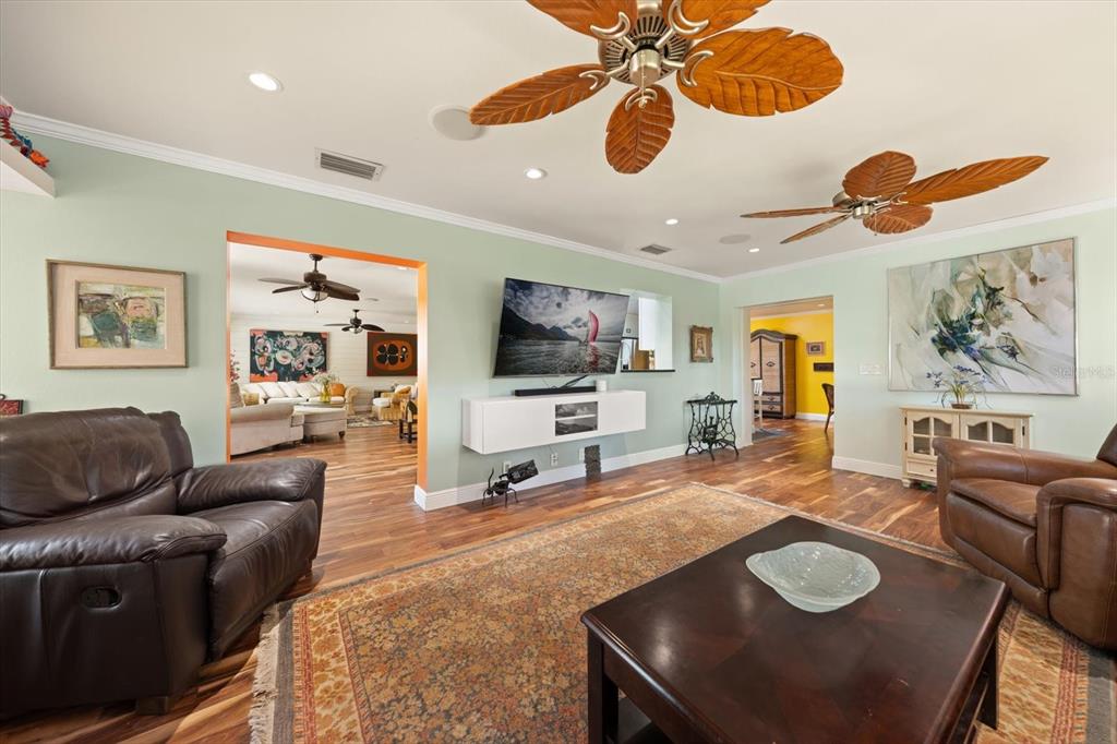 1921 Cardinal Road Dunedin, FL 34698 - Photo 20 of 52 a living room with furniture and a flat screen tv