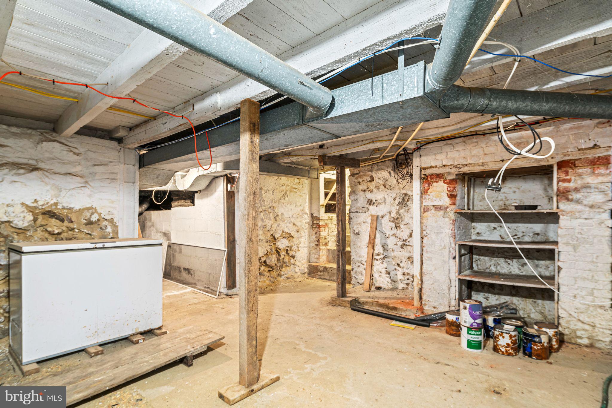 39 Main Street Pilesgrove, NJ 08098 - Photo 20 of 30 a view of a storage room with an empty shelves