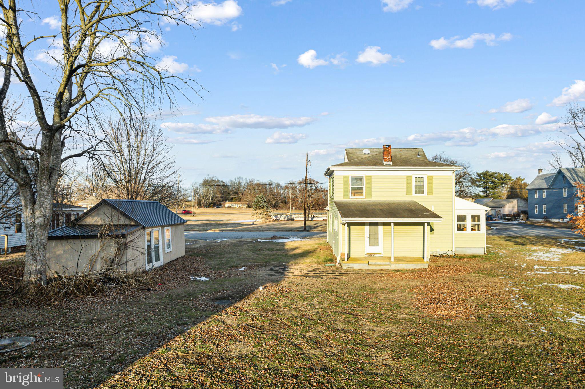 39 Main Street Pilesgrove, NJ 08098 - Photo 21 of 30 a swimming pool with yard and mountain view in the back