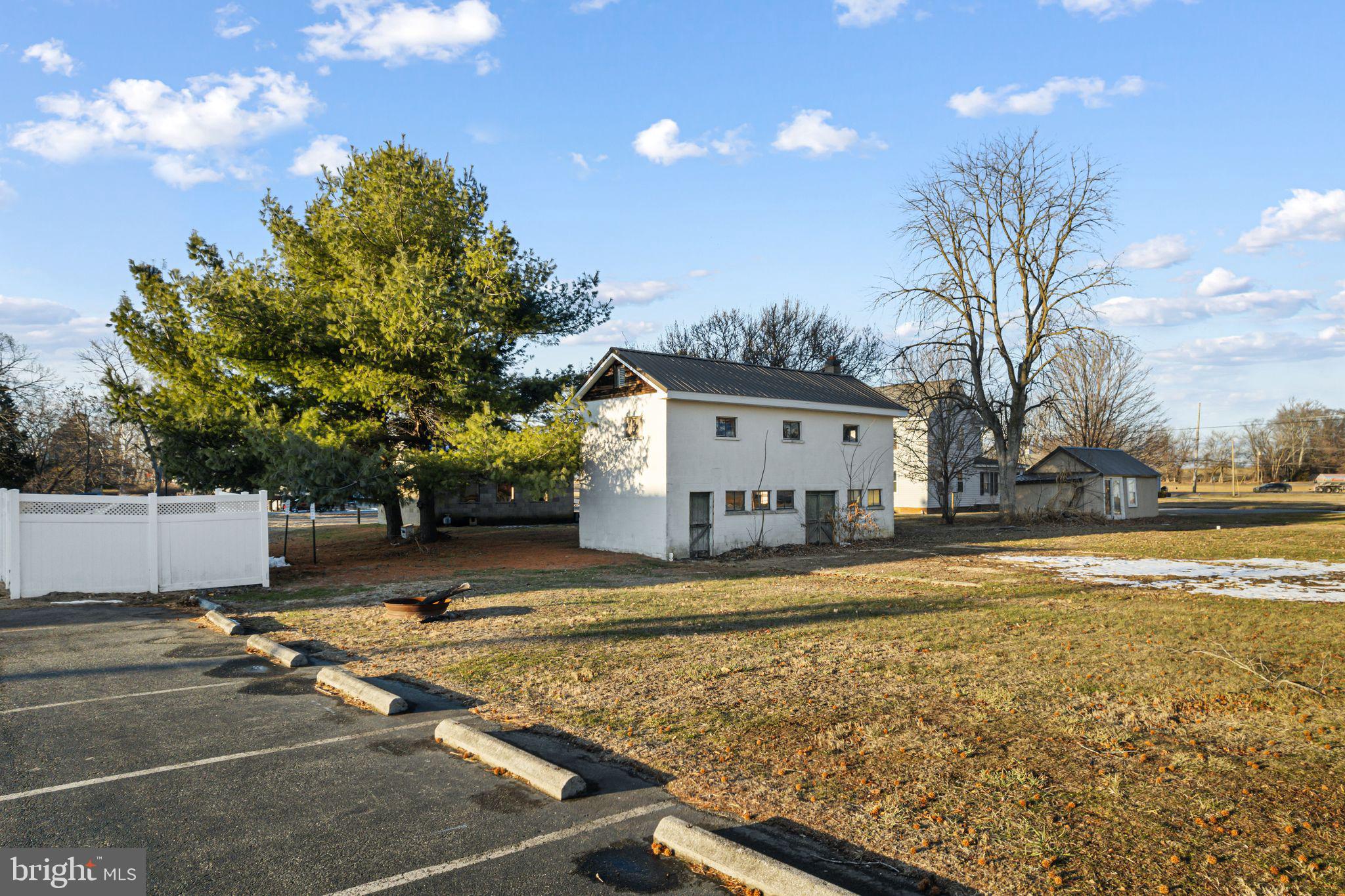 39 Main Street Pilesgrove, NJ 08098 - Photo 28 of 30 a view of a house with pool and trees