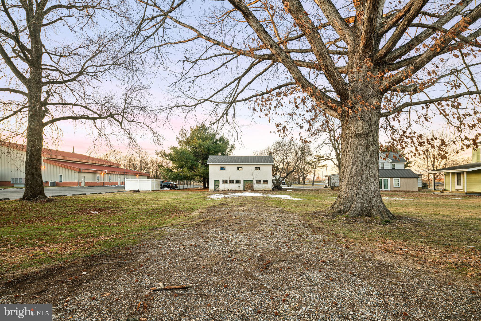 39 Main Street Pilesgrove, NJ 08098 - Photo 30 of 30 a view of a big yard next to a large tree