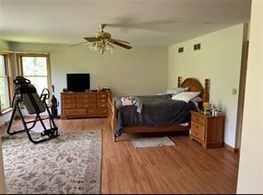 110-130 Winters Road Butler, PA 16002 - Photo 8 of 13 a living room with furniture a flat screen tv and a rug