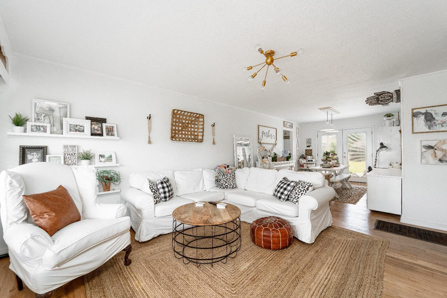 2504 42nd Street Lubbock, TX 79413 - Photo 2 of 24 a living room with furniture and a wooden floor
