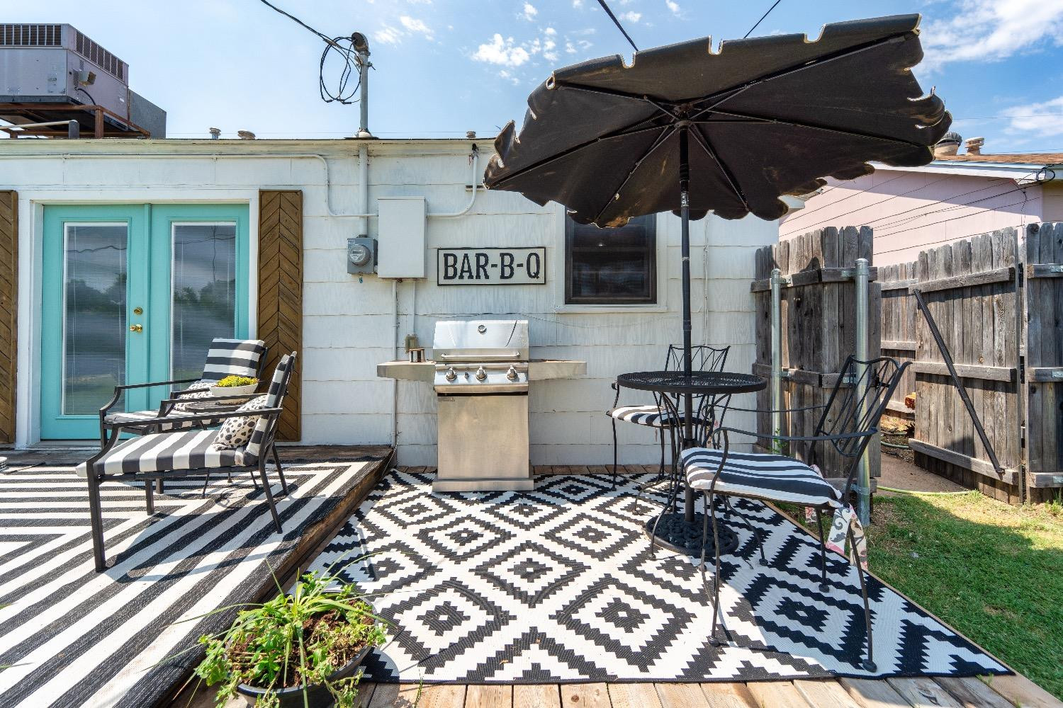 2504 42nd Street Lubbock, TX 79413 - Photo 24 of 24 a view of a chairs and table in the patio