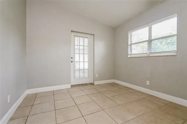 a view of an empty room and window