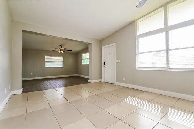 a view of an empty room with a window