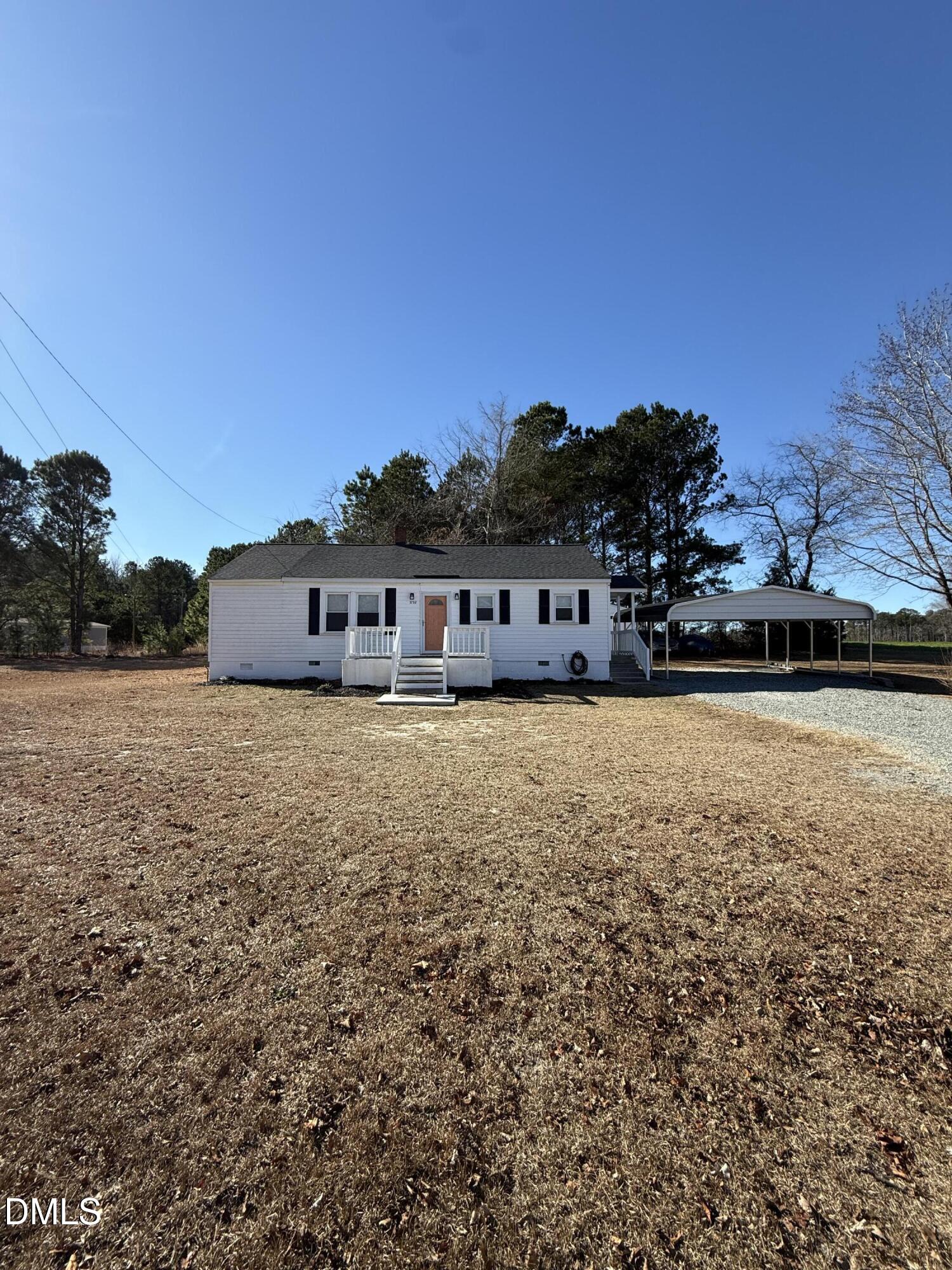 a front view of house with a yard