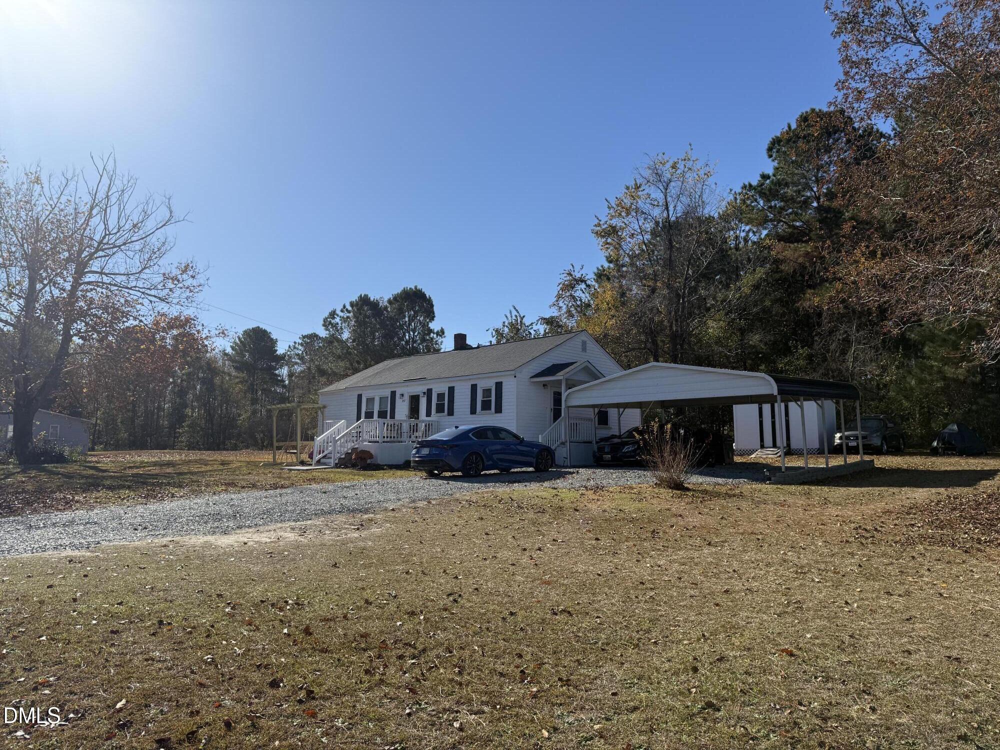 3792 McNeill Hobbs Road Bunnlevel, NC 28323 - Photo 2 of 14 a view of a house with a yard