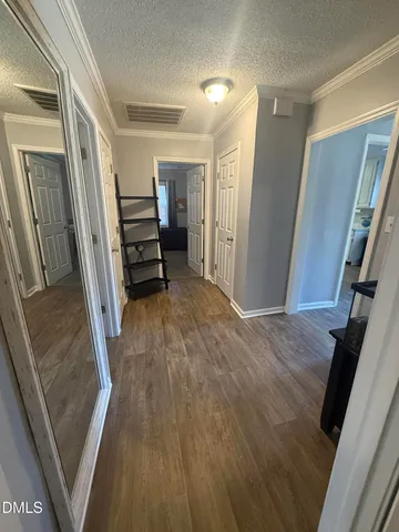 a view of a hallway and stairs