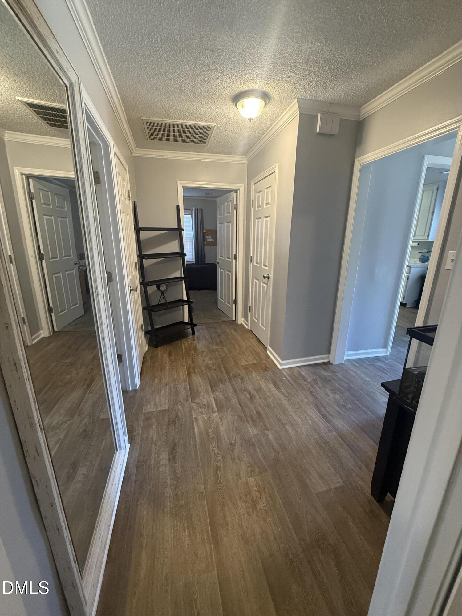 3792 McNeill Hobbs Road Bunnlevel, NC 28323 - Photo 10 of 14 a view of a hallway and stairs