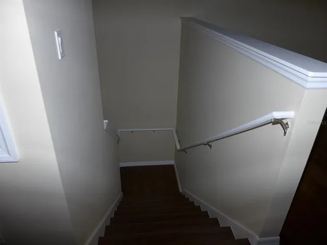 a view of hallway with stairs