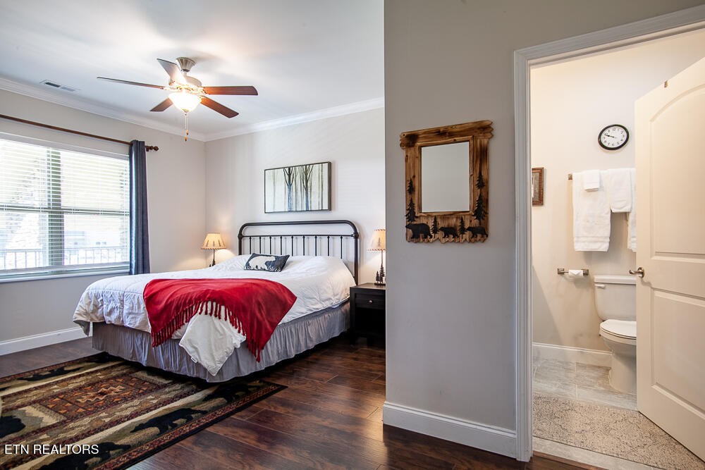 338 Shooting Star Loop, Unit 203 Townsend, TN 37882 - Photo 14 of 30 a spacious bedroom with a bed and a window