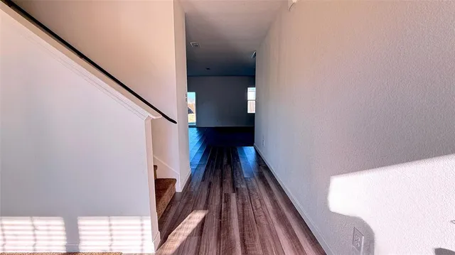 a view of entryway with wooden floor