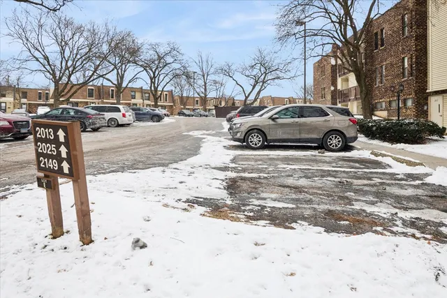 a view of city street with a snow on the road