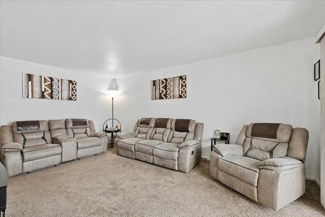 a living room with furniture and a couch