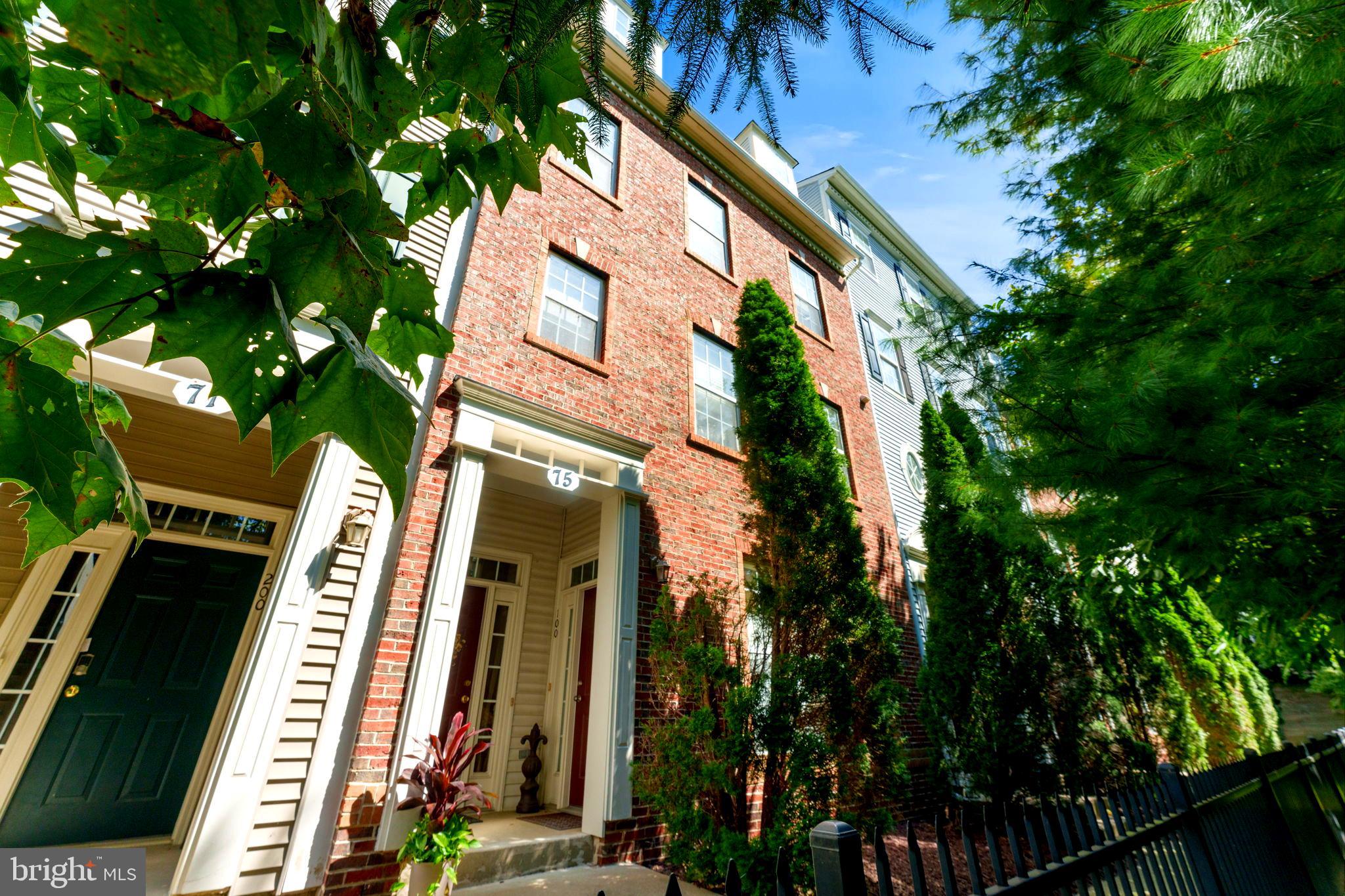 75 Swanton Lane, Unit 200 Gaithersburg, MD 20878 - Photo 25 of 54 a view of a house with a tree