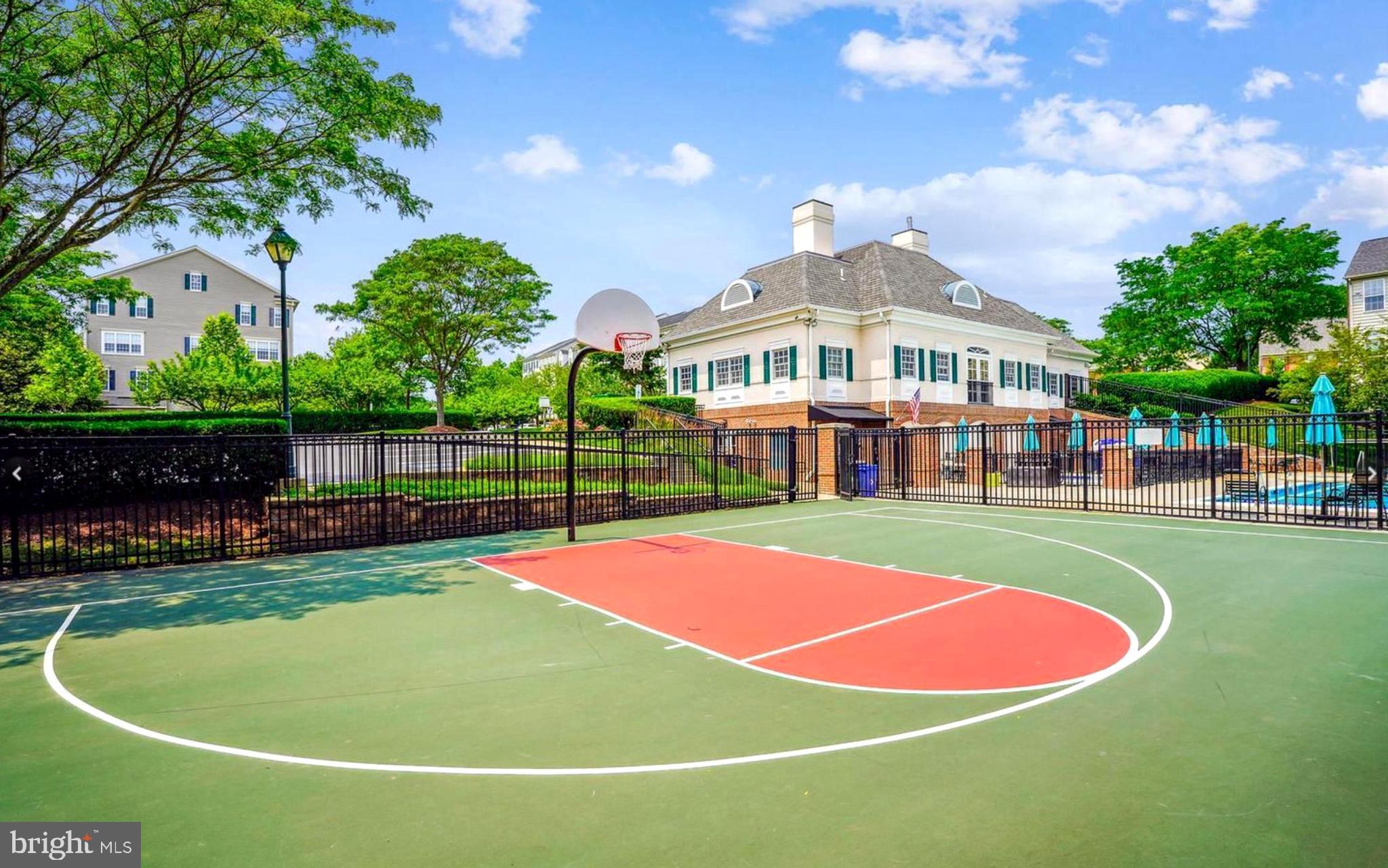 75 Swanton Lane, Unit 200 Gaithersburg, MD 20878 - Photo 29 of 54 a view of a basket ball ground and a patio